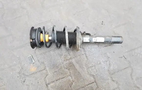 Volkswagen Golf Sportsvan Front shock absorber with coil spring 5Q0412014MH