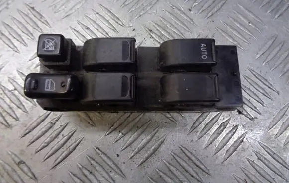 Suzuki Liana Front door window switch trim 