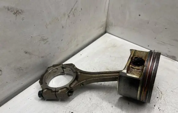 Piston with connecting rod
