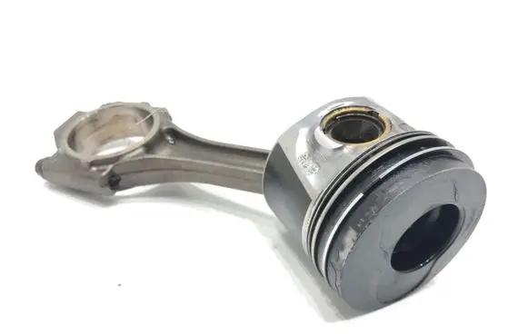 Piston with connecting rod
