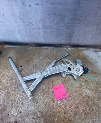 Toyota Yaris Front door window regulator with motor 8571052030 0621009982