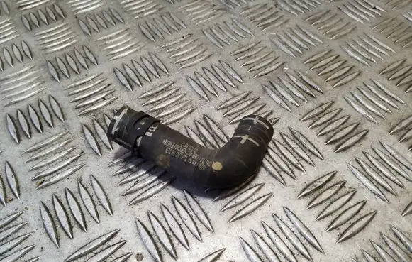 Volkswagen PASSAT B8 Engine coolant pipe/hose 04L121058AC