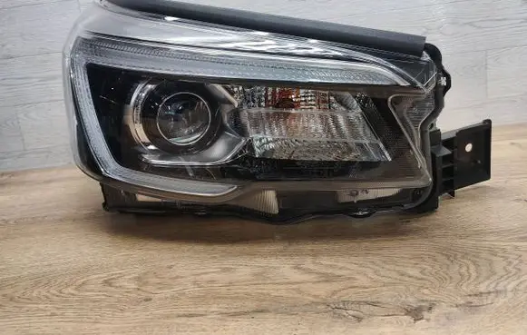 Subaru Forester SK Headlight/headlamp 1006040J