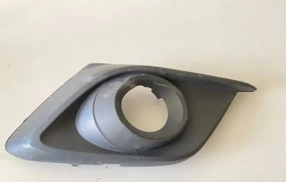 Mazda 3 II Front fog light trim/grill BJS850C11 T25AS20