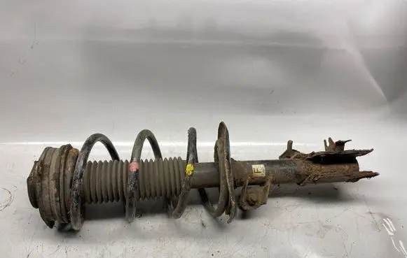 Front shock absorber with coil spring