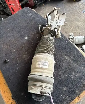 Volkswagen Touareg I Front air suspension shock absorber 7L6412021AF