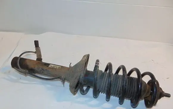 Volkswagen Golf IV Front shock absorber with coil spring 1J0413031S