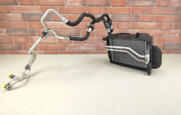 BMW X5 E70 Engine oil radiator 7585286 7222870 7555205