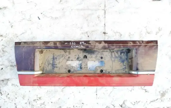 Mazda 626 Trunk door license plate light bar 