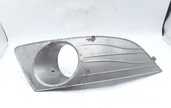 Dacia Logan I Front fog light trim/grill 2004075