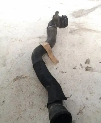 Volkswagen Touareg I Engine coolant pipe/hose 09L193317