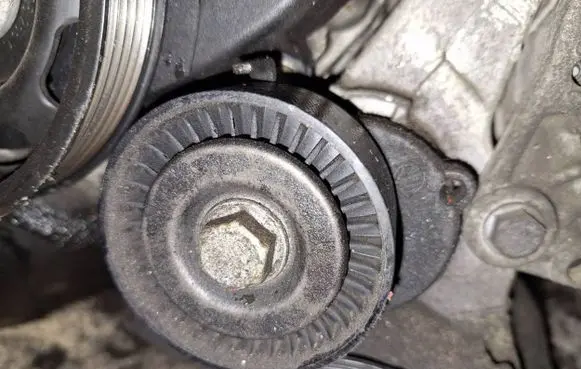 Generator/alternator belt tensioner