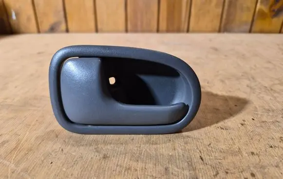 Mazda 323 Rear door interior handle DH221