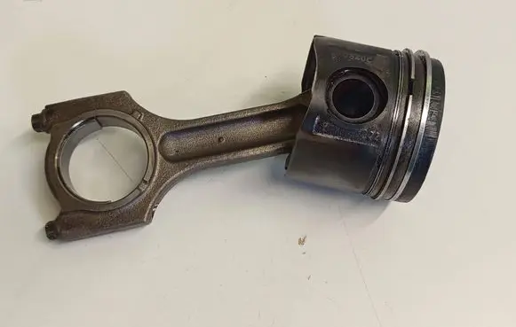 Piston with connecting rod
