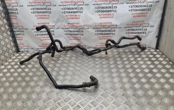 Volkswagen PASSAT B6 Engine coolant pipe/hose 03L121151D