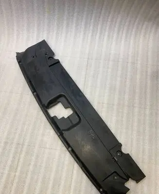 Engine bonnet/hood lock trim molding