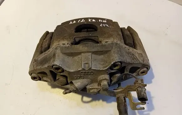 Audi A6 S6 C6 4F Front brake caliper 973