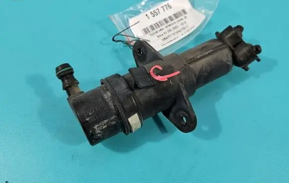 BMW X3 E83 Headlight washer spray nozzle 700194909 IMPRK1557776