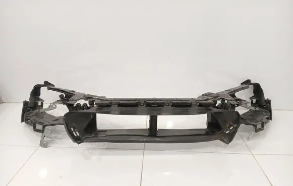 Radiator support slam panel