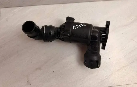 Volkswagen Touran III Thermostat/thermostat housing 04L121111H