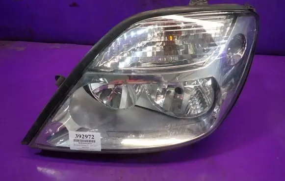Renault Scenic I Headlight/headlamp 7701047604