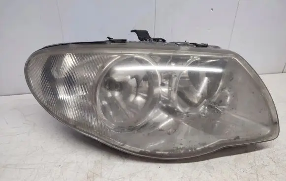 Chrysler Grand Voyager IV Headlight/headlamp 04857830AC