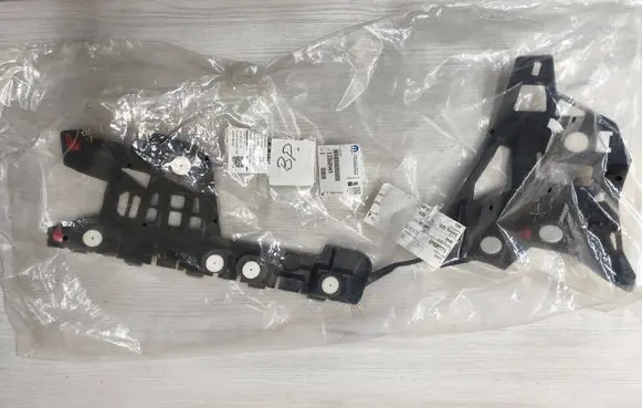 Opel Astra J Bumper support mounting bracket corner 13368949