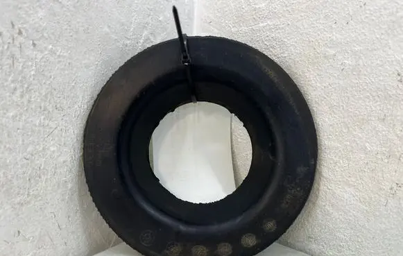 Tesla Model 3 Rear coil spring rubber mount 104447500F