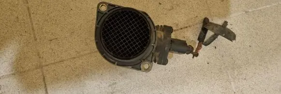 Volkswagen Touareg I Mass air flow meter 1J0973775A