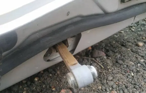 Volvo S60 Rear door check strap stopper