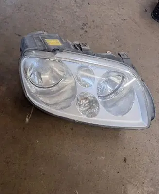 Volkswagen Touran I Headlight/headlamp 0301205202 1T0941006F