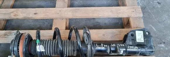 Front shock absorber with coil spring