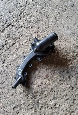 Chrysler 200 Thermostat housing 05184653AF