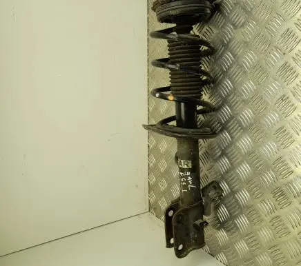 Nissan Juke I F15 Front shock absorber with coil spring 5403