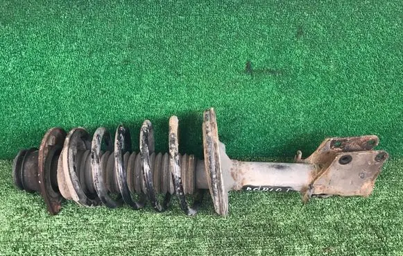 Front shock absorber with coil spring