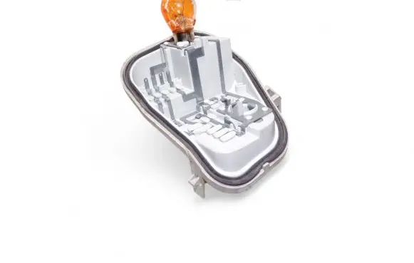 Tail light bulb cover holder