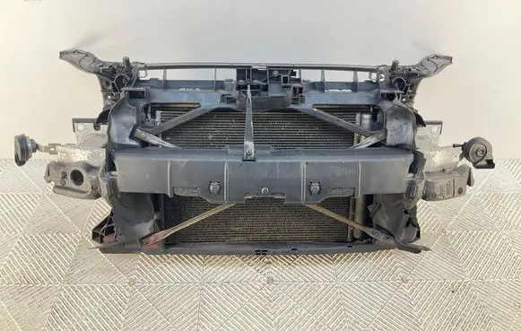 Radiator support slam panel