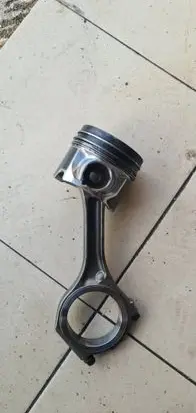 Piston with connecting rod
