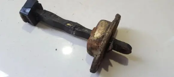 Mitsubishi Galant Rear door check strap stopper