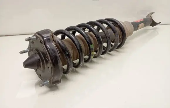 Front shock absorber with coil spring