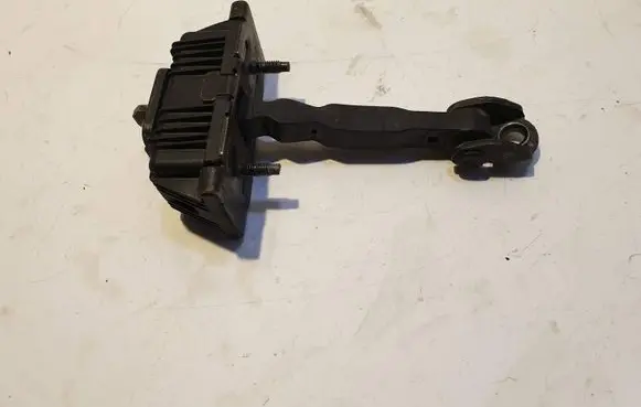 Front door check strap stopper