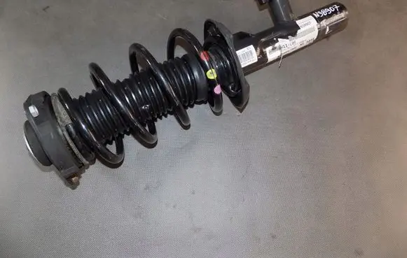 Volkswagen Touran II Front shock absorber with coil spring 1T0412022FQ
