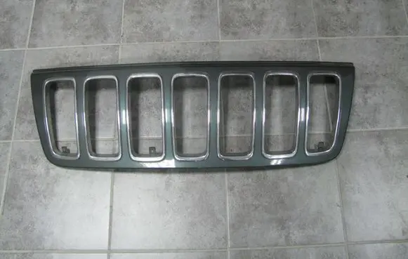 Jeep Grand Cherokee (WJ) Front bumper upper radiator grill 5GL79TRMAA