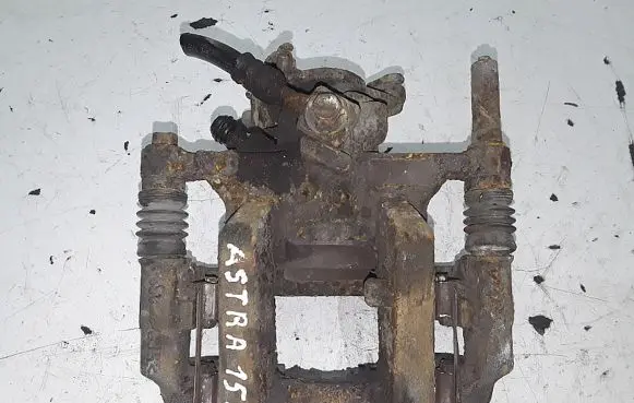 Opel Astra J Rear brake caliper