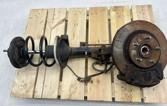 Front shock absorber with coil spring