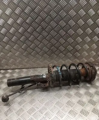 Volkswagen Fox Front shock absorber with coil spring