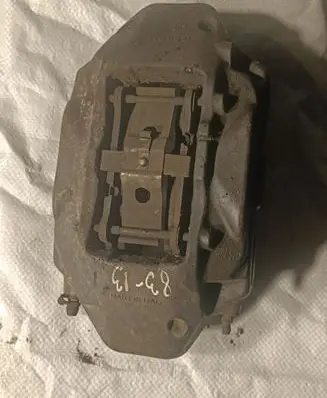 Volkswagen Touareg I Front brake caliper 209236052A