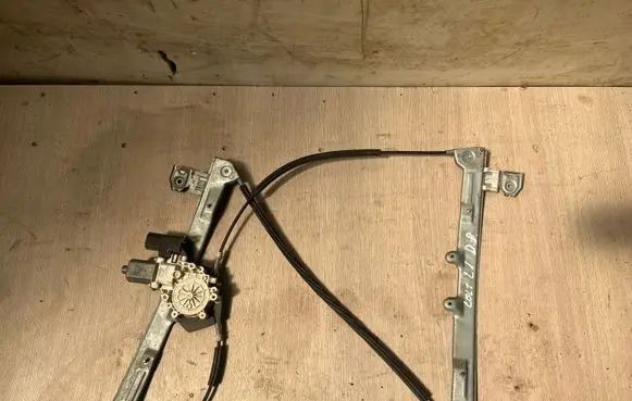 Mitsubishi Colt Front door window regulator with motor 