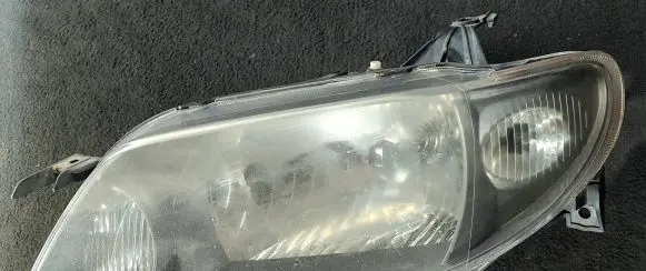Mazda 323 F Headlight/headlamp 98869885 E13175 0102