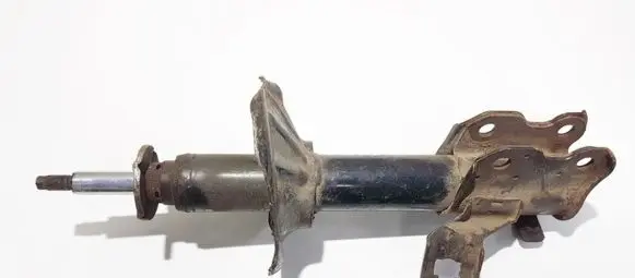 Nissan Sunny Front shock absorber/damper 633116